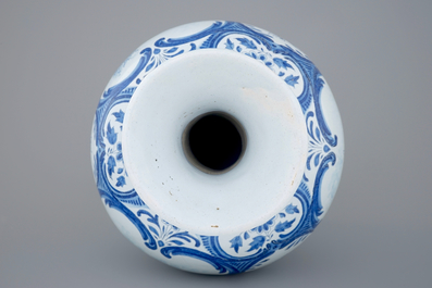 A very tall blue and white Dutch Delft garlic neck vase, Makkum, 19th C.
