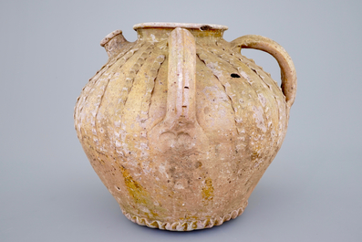 A very early Andenne proto-stoneware spouted jug, 13th C.