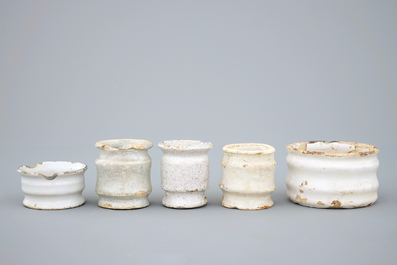 A set of five monochrome white Dutch Delft ointment jars, 17th C.