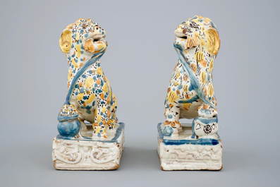 A pair of polychrome Spanish Talavera pottery lions, 18th C.