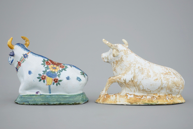 Two Dutch Delftware models of cows, 18/19th C.