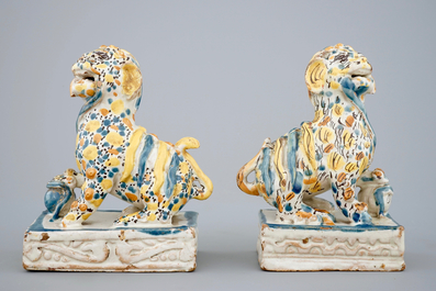 A pair of polychrome Spanish Talavera pottery lions, 18th C.