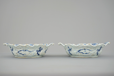 A pair of Dutch Delft blue and white openworked baskets, 18th C.