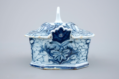 A blue and white Dutch Delft butter tub on stand, 18th C.
