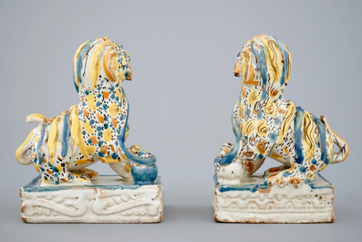 A pair of polychrome Spanish Talavera pottery lions, 18th C.