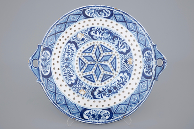 A big blue and white fish strainer dated 1757, Makkum, Friesland