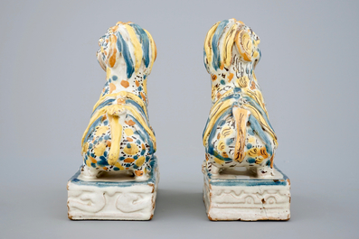 A pair of polychrome Spanish Talavera pottery lions, 18th C.