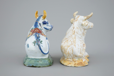 Two Dutch Delftware models of cows, 18/19th C.