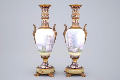 Een paar S&egrave;vres porseleinen vazen met montuur in brons en email champlev&eacute;, 19e eeuw