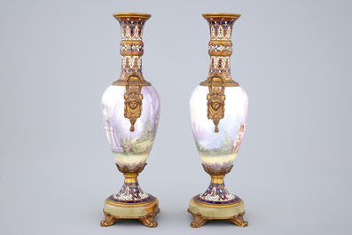 Une paire de vases en porcelaine de S&egrave;vres mont&eacute; en bronze et email champlev&eacute;, 19&egrave;me