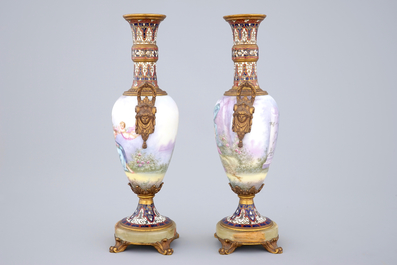 Une paire de vases en porcelaine de S&egrave;vres mont&eacute; en bronze et email champlev&eacute;, 19&egrave;me