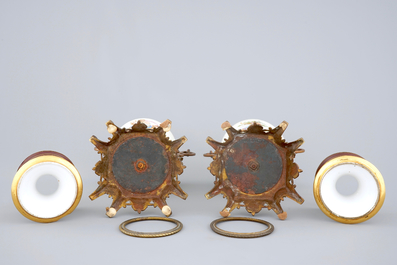 A pair of S&egrave;vres style vases with bronze mounts, Brussels, 19th C.