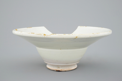 A white Dutch Delft shaving bowl, 18th C.