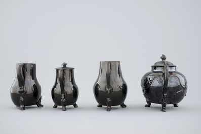 A set of black glazed teapots and jugs in Namur pottery, 18th C.