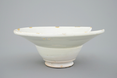 A white Dutch Delft shaving bowl, 18th C.