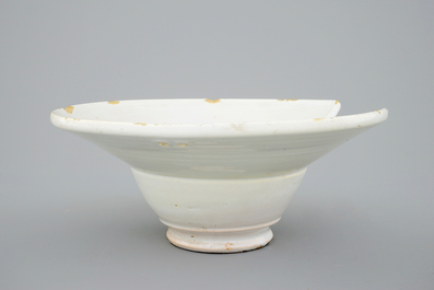 A white Dutch Delft shaving bowl, 18th C.