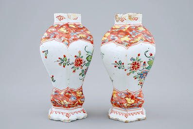 A pair of Dutch Delft petit feu vases, 18th C.