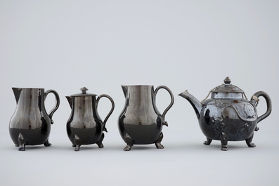 A set of black glazed teapots and jugs in Namur pottery, 18th C.