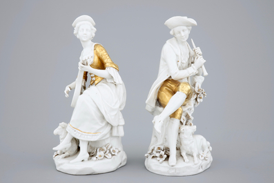 A pair of white and gilt Capodimonte porcelain figures of musicians, 19th C.