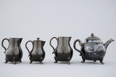 A set of black glazed teapots and jugs in Namur pottery, 18th C.