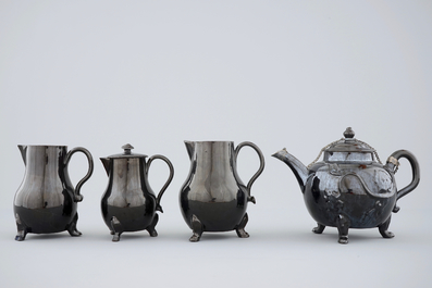 A set of black glazed teapots and jugs in Namur pottery, 18th C.