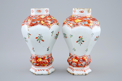 A pair of Dutch Delft petit feu vases, 18th C.