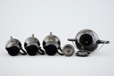 A set of black glazed teapots and jugs in Namur pottery, 18th C.