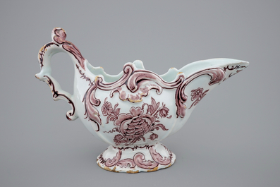 A manganese Dutch Delftware sauceboat, 18th C.