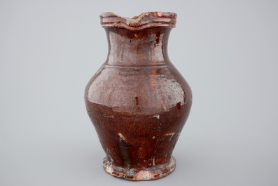 A brown-glazed stoneware jug, France, 18th C.