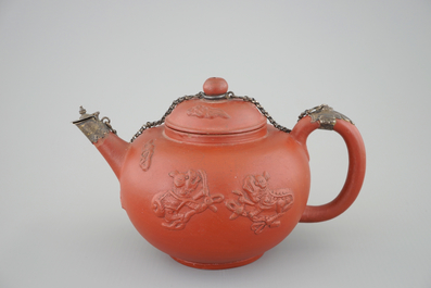A Dutch Delft Ary de Milde red earthenware teapot and cover, late 17th C.