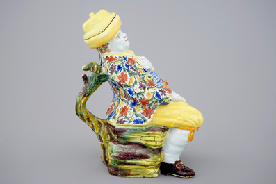 A polychrome Dutch Delft table fountain in the shape of a man, 18th C.