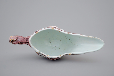 A manganese Dutch Delftware sauceboat, 18th C.