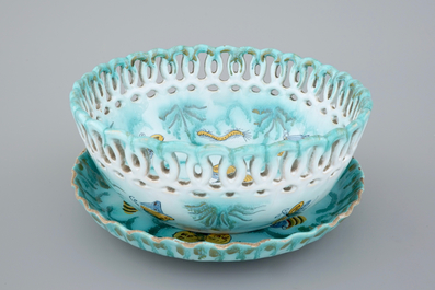 A Brussels faience basket on stand with butterflies and caterpillars, 18th C.