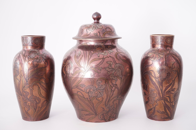 A tall three-piece Art Nouveau luster-glazed vase garniture, Boch Fr&egrave;res K&eacute;ramis