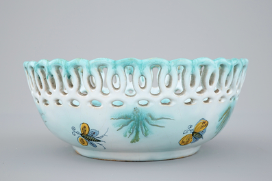 A Brussels faience basket on stand with butterflies and caterpillars, 18th C.