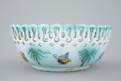 A Brussels faience basket on stand with butterflies and caterpillars, 18th C.