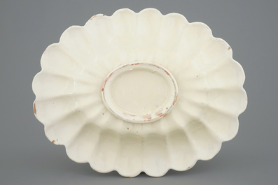 A rare white Delft oval gadrooned dish, 17th C.