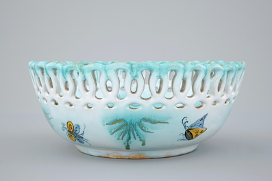 A Brussels faience basket on stand with butterflies and caterpillars, 18th C.