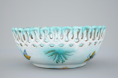 A Brussels faience basket on stand with butterflies and caterpillars, 18th C.