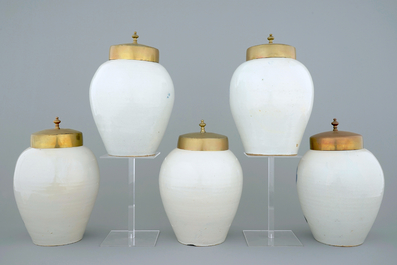 A set of five Dutch Delft tobacco jars with brass lids, 18th C.