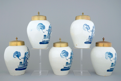 A set of five Dutch Delft tobacco jars with brass lids, 18th C.