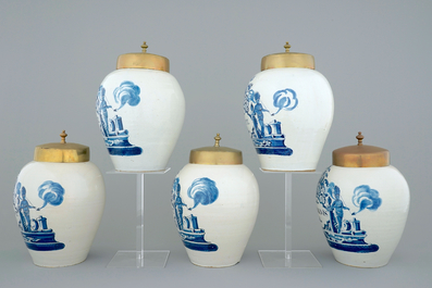 A set of five Dutch Delft tobacco jars with brass lids, 18th C.