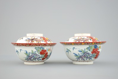 A pair of rare polychrome Dutch Delft bowls and covers, early 18th C.