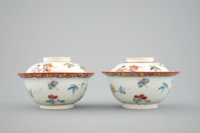 A pair of rare polychrome Dutch Delft bowls and covers, early 18th C.