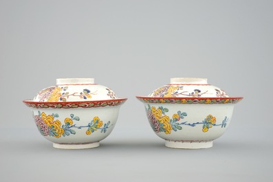 A pair of rare polychrome Dutch Delft bowls and covers, early 18th C.