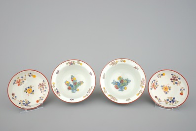 A pair of rare polychrome Dutch Delft bowls and covers, early 18th C.