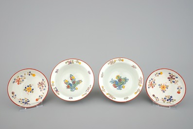 A pair of rare polychrome Dutch Delft bowls and covers, early 18th C.