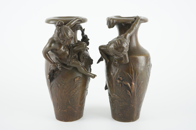 After Auguste Moreau (1834-1917), A pair of bronze Art Nouveau vases, 19/20th C.