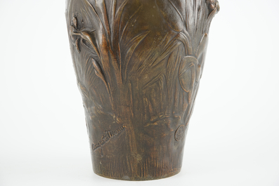After Auguste Moreau (1834-1917), A pair of bronze Art Nouveau vases, 19/20th C.