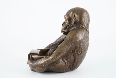 A bronze sculpture of a monkey holding a tray, 20th C.